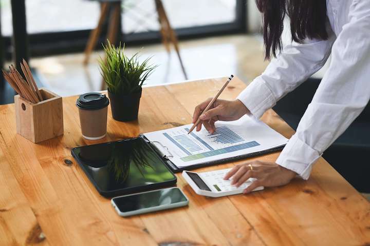 A woman using a calculator